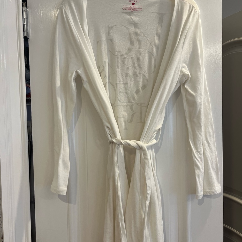 Victoria Secret white robe with gold lettering. Never worn.
